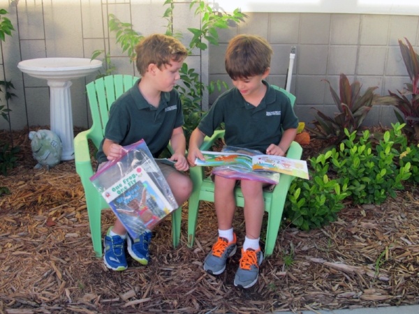 Important to read to children, kindergarten reads outside